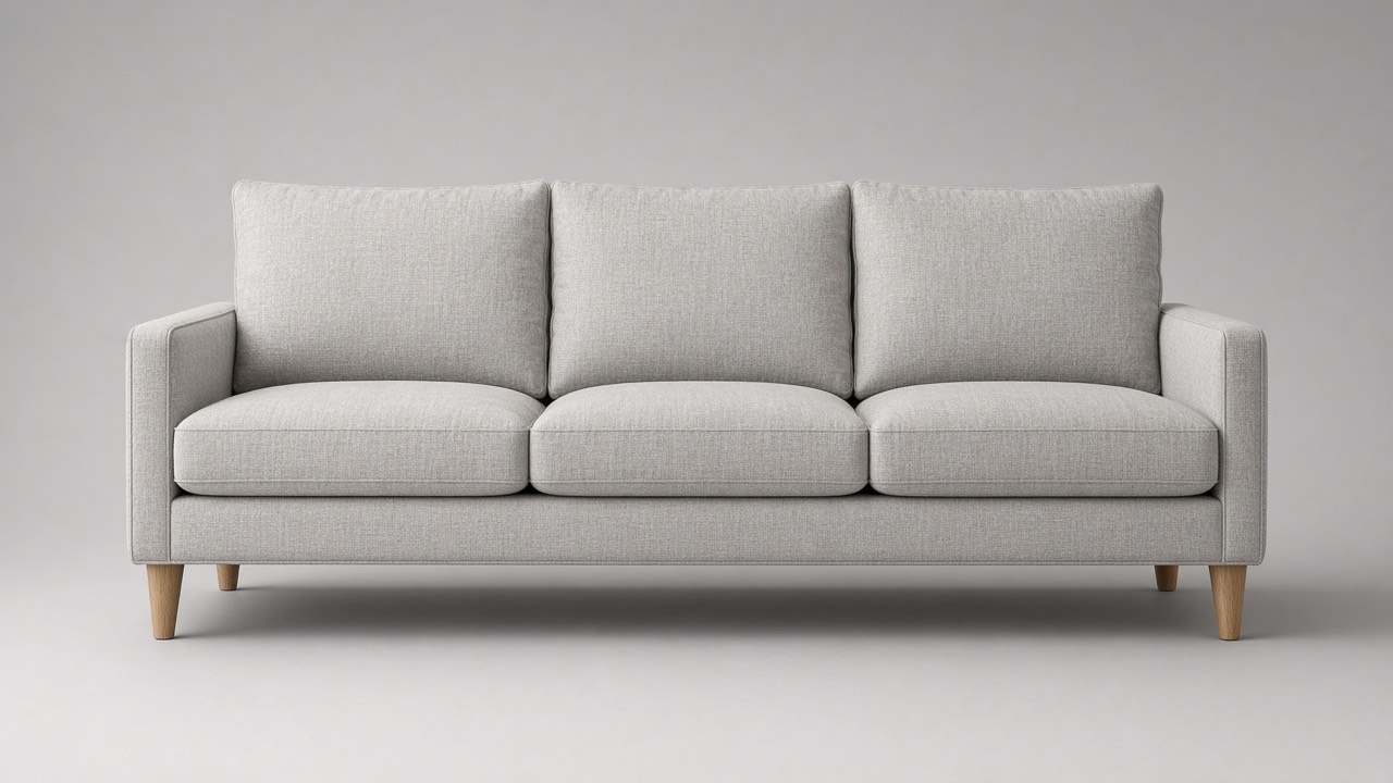 Studio photograph of a linen lounge sofa